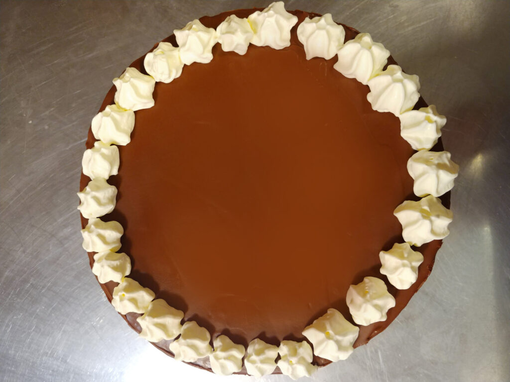 Example of Fancy Cakes: Parisian Chocolate Cake with cream and chocolate coatingtop view