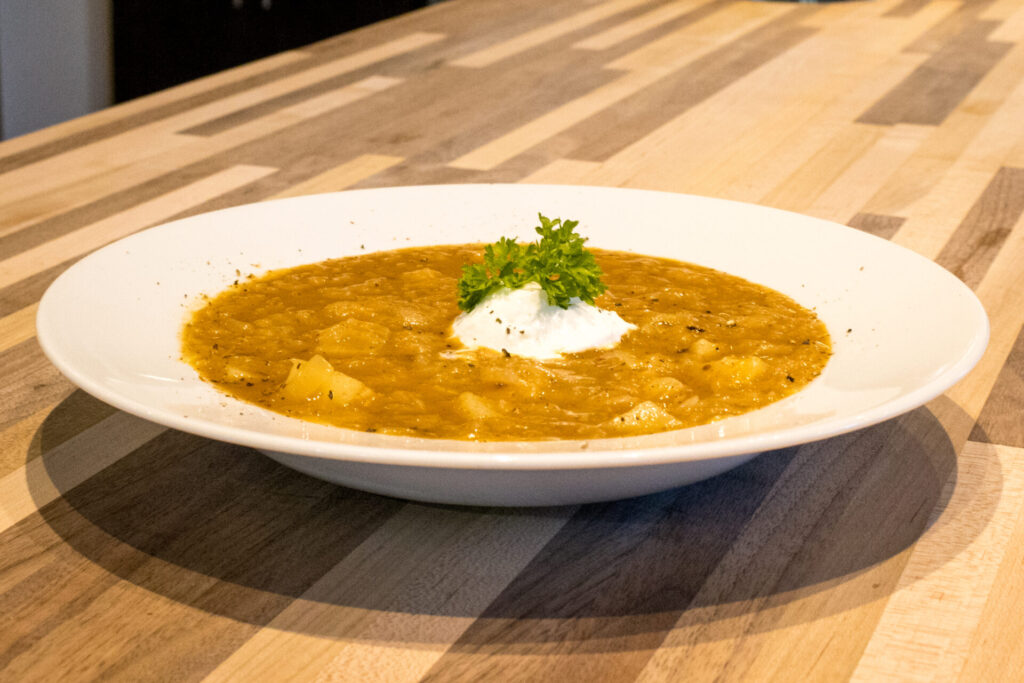 Czech Sauerkraut Soup Zelňačka side shot from the medium distance