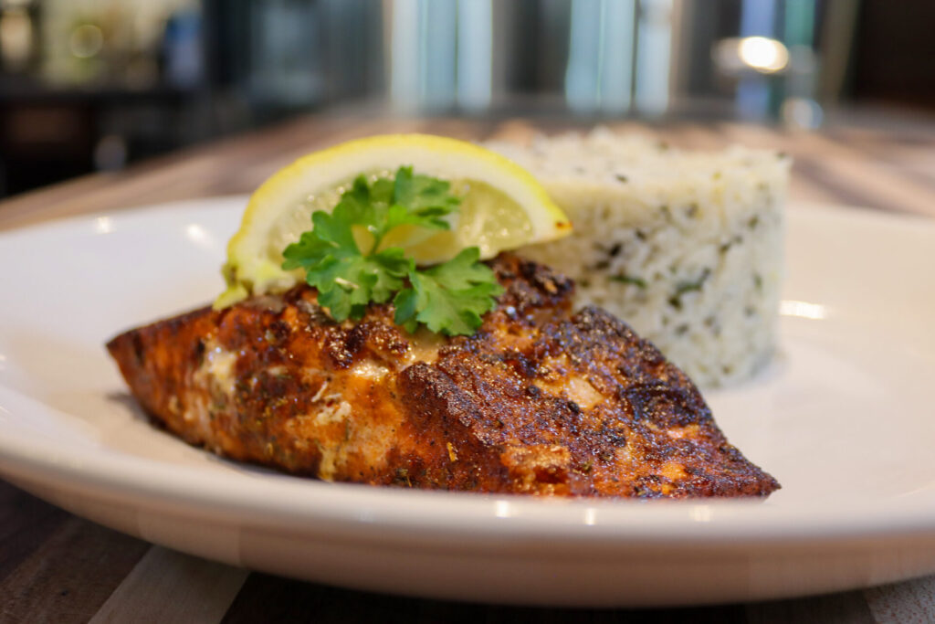 Blackened Salmon on the plate with rice