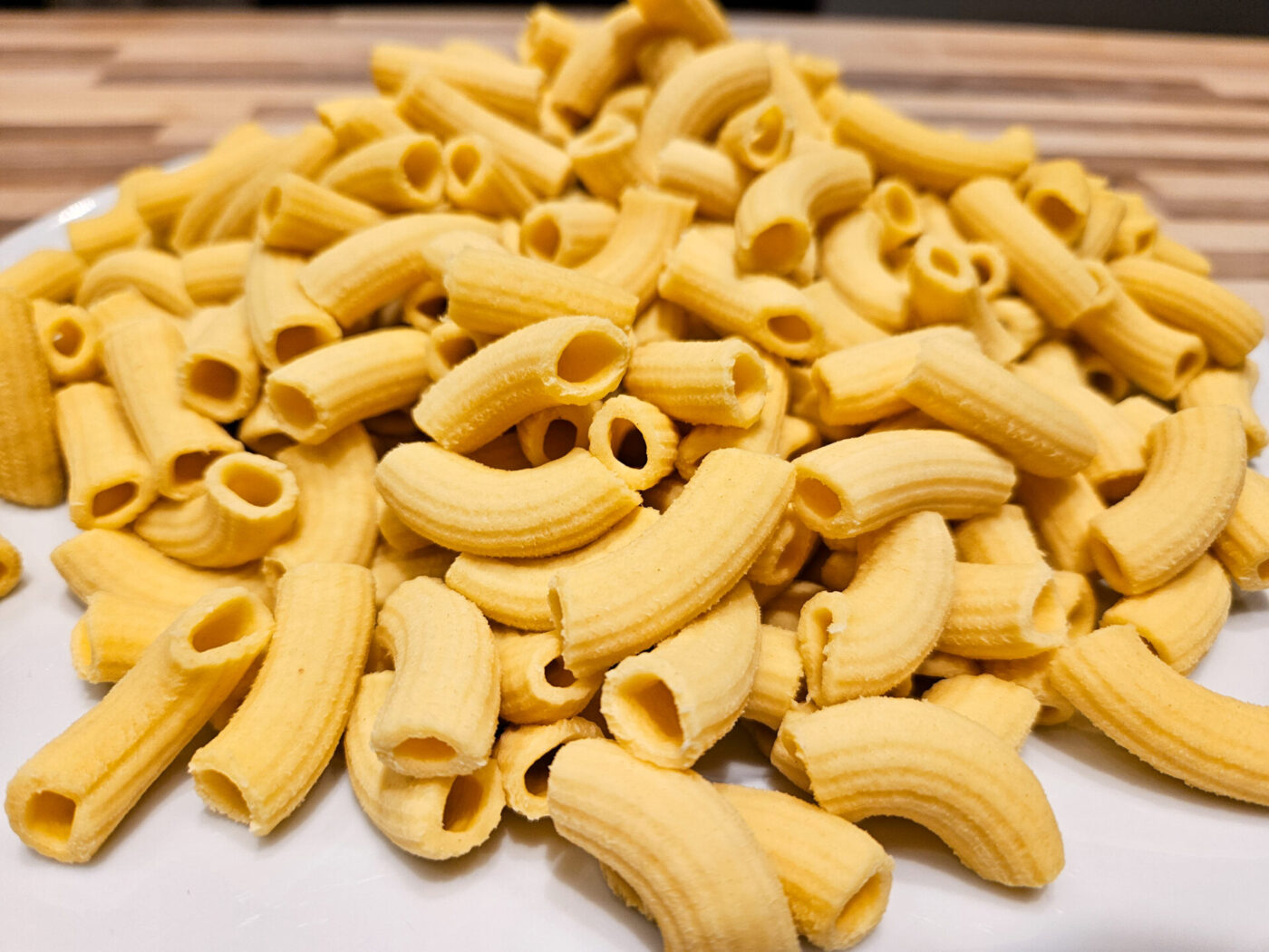 Fresh macaroni pasta on the plate