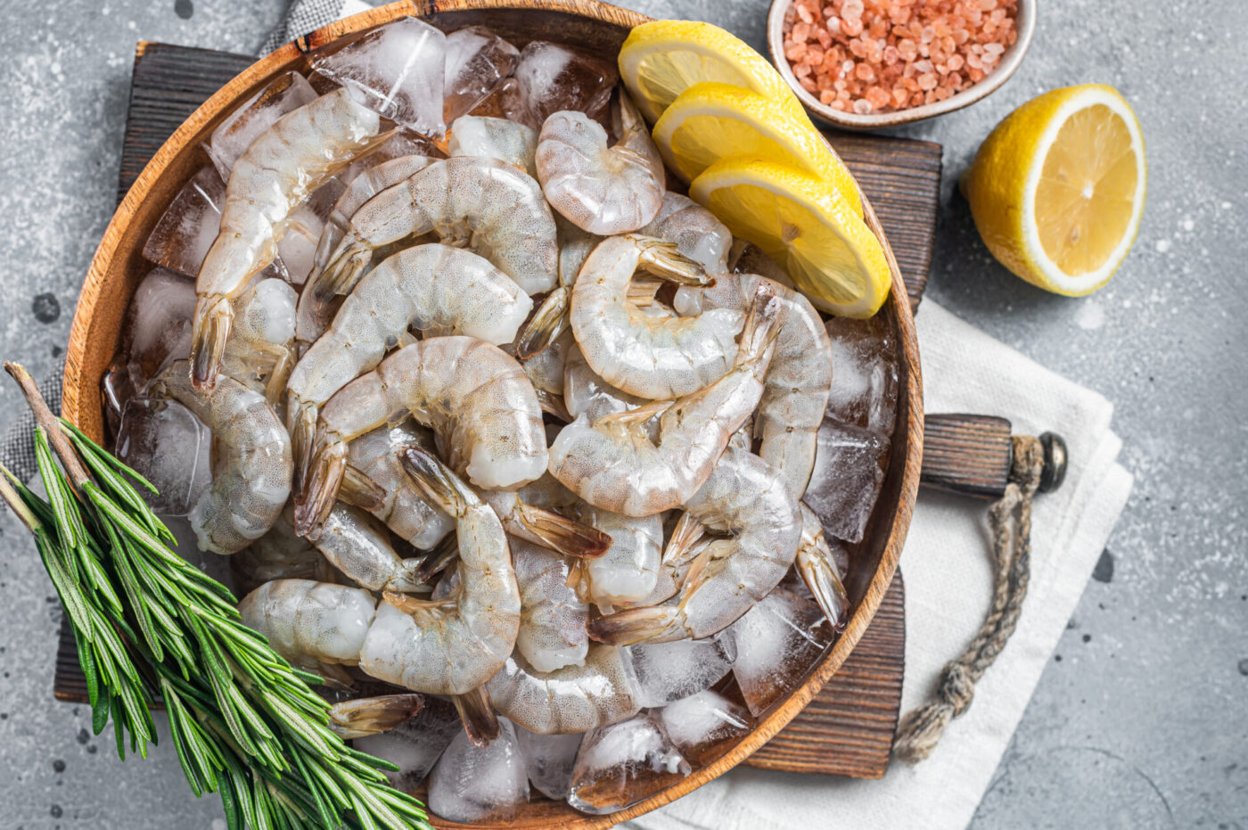 Uncooked Raw peeled extra larger shrimp in the bowl.