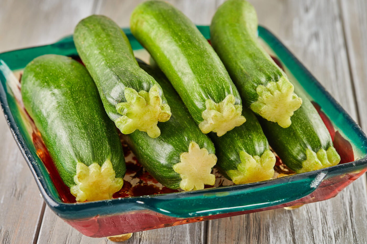 Stacked zucchini on plate