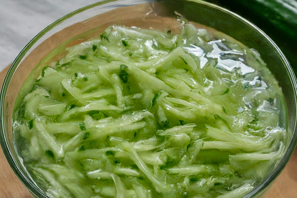 Czech Cucumber Salad Okurkový Salát in the small bowl, detail shot