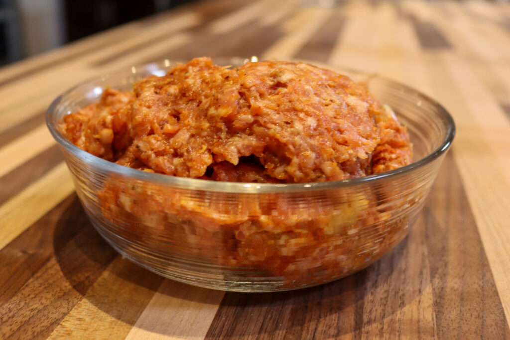 Italian Sausage in the glass bowl, medium distance side shot 2