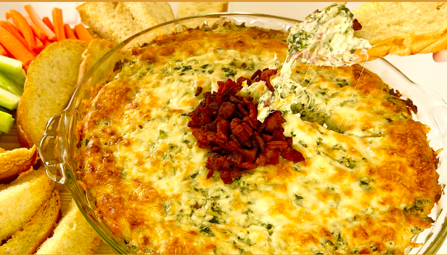 Kale Artichoke Dip in detail with vegetable in the background