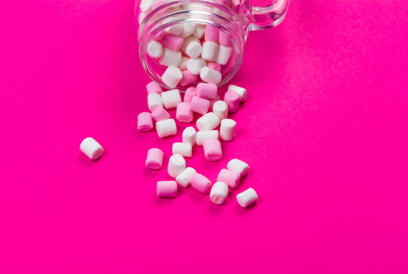 mini marshmallows on the pink background