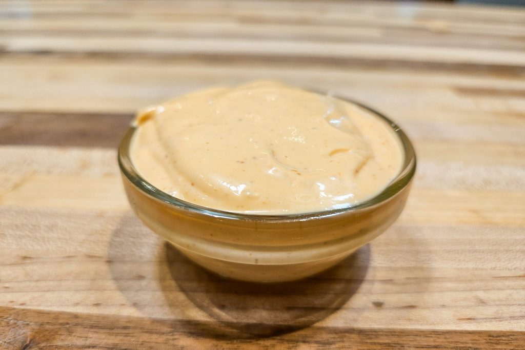 spicy mayo in the bowl, medium distance side shot