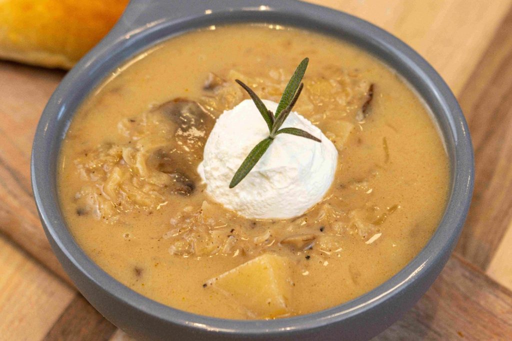 Valašská Kyselica Soup in gray soup bowl in detail top side shot